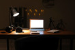 © Pixel-Shot - Workplace of photographer late in evening