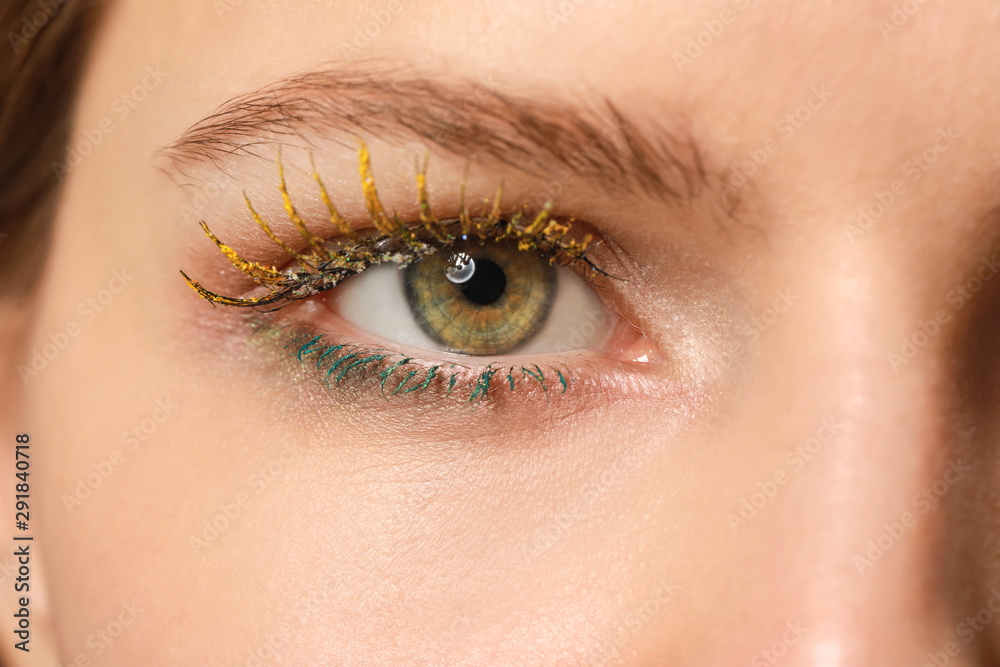 Young woman with creative eyelashes, closeup