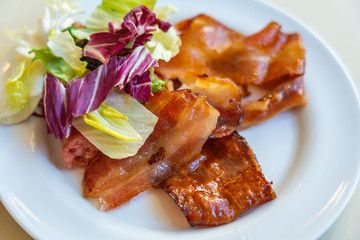 Wall Mural - Close up photo of grilled bacon and salad for breakfast