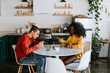 © Leah Flores/Stocksy - Couple Eating Dinner Together