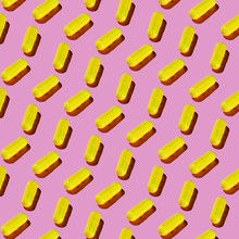 Yellow Pharma Pill Pattern On Pastel Pink