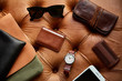 © leandro crespi/Stocksy - Masculine leather accessories flat lay