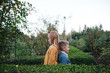 © Rob and Julia Campbell/Stocksy - Siblings having fun together outside.