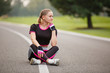 © Olga Mishyna - sport girl making exercises outdoors. Young sport woman in a park. Sport and fitness on open air