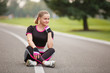 © Olga Mishyna - sport girl making exercises outdoors. Young sport woman in a park. Sport and fitness on open air