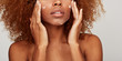 © leandro crespi/Stocksy - Crop skin detail woman using lotion