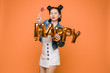 © Вячеслав Косько - Fashionable womancelebrating a party event having fun and smiling with balloons