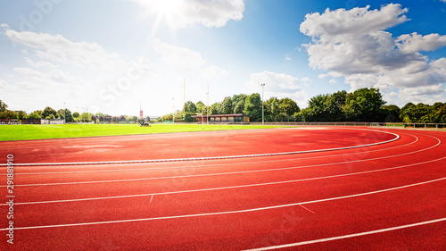 Fotomural Red running track in stadium