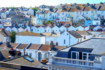 Wall Mural - rows of English terraced houses close together on top of each other on a hill