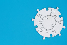 White Jigsaw Pieces On A Blue Background, Copy Space, Concept Image Of Unfinished Task.  Missing Jigsaw Puzzle Pieces And Business Concept With A Puzzle Piece Missing.