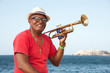 © robertharding - Trumpet player along the Malecon in Havana, Cuba