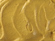 Yellow mustard sauce, spread, background and texture