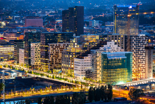 Night view of illuminated street in the Oslo business center Wallpaper Mural