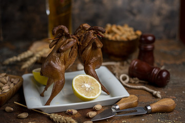 Wall Mural - Two fried quailes in front of each other