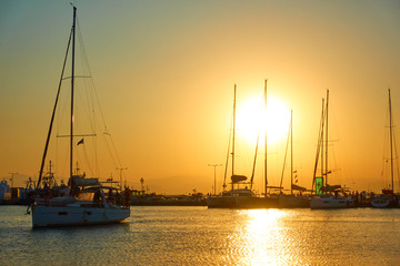 Wall Mural - Port of Aegina and yachts at sundown