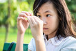 © Satjawat - Asian beautiful child girl pulling her hair with her fingers in mental health problems,nervous system,brain system or schizophrenia,female psychiatric patient in trichotillomania hair-pulling disorder