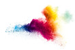 Colorful powder explosion on white background.Pastel color dust particle splashing.