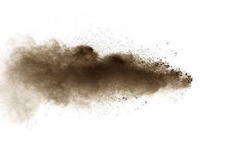 Wall Mural - abstract deep brown dust explosion on white background. freeze motion of coffee liked color dust spl