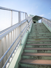 Wall Mural - landscape view of the stair up to overpass in tyokyo city without any pedestrian in summer sunshine 