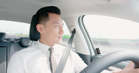 Wall Mural - business asian man driving car