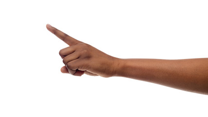 Female hand pointing aside with forefinger, isolated on white background