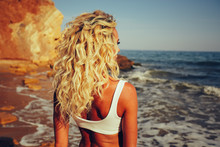 Blonde Curly Hair Tan Girl Watching Ocean