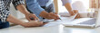 © PIC SNIPE - Engineer or architect teamwork working on construction project with building model and blueprint in office. Construction concept.