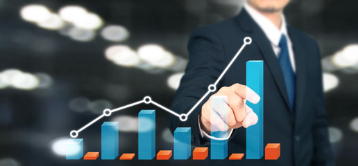 Businessman plan graph growth and increase of chart positive indicators i