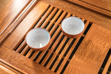 Chinese tea service on a wooden bamboo table