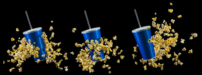 Wall Mural - Set of blue cups with cap and popcorn isolated on black background