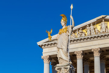 Wall Mural - Athena statue at the front of Austrian parliament building in Vienna, Austria