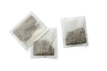 Close-up Of The Group Of Tea Bags Isolated On White Background