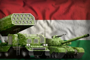 Hungary heavy military armored vehicles concept on the national flag background. 3d Illustration