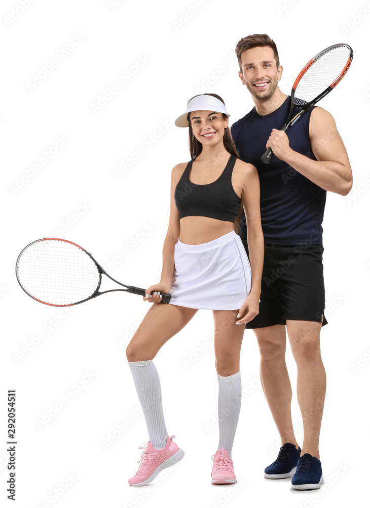 Young tennis players on white background