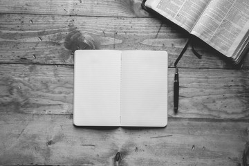 Wall Mural - Overhead shot of a notebook near fountain pen in black and white