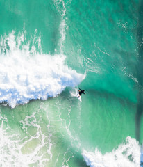 Wall Mural - Beach holidays pictures Drone views of beach, waves, surfers, swimmer, sea, ocean in Australia. Beautiful aerial of coastal images.