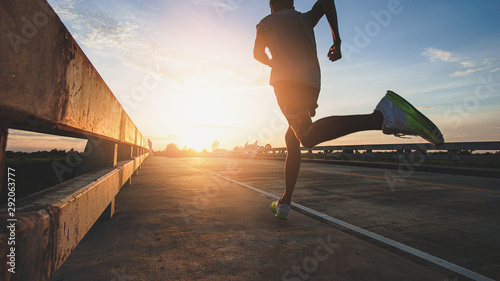 Cuadros en Lienzo Athlete runner feet running on road, Jogging at outdoors