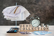© doucefleur - debt collection concept with unpaid bills,calculator,coin on desk