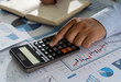 © onephoto - businessman work math  finances and calculate cost invoice for budget to buy home