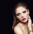 attractive young model with bright make-up and manicure