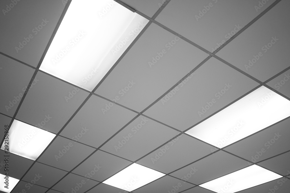 White ceiling with neon light bulbs in uprisen view.as background interior decoration concept with copy space for your text or design. - obrazy, fototapety, plakaty 