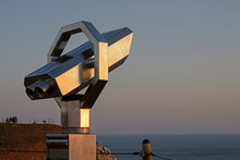 Public Telescope To Watch The Birds At A Vantage Point On The Cliffs Of Heligoland During Sunset, Copy Space