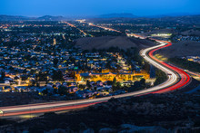 Twilight View Of Commuter Freeway Traffic In Suburban Simi Valley Near Los Angeles In Ventura County, California.