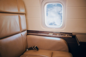 Wall Mural - Private jet plane interior with leather seats