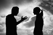 © kieferpix - Couple fighting and yelling silhouette.