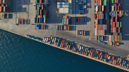 Aerial top down photo of containers in ship port for business Logistics and transportation of Container Cargo, logistic import export and transport