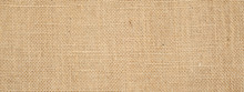 Cotton Woven Fabric Background With Flecks Of Varying Colors Of Beige And Brown. With Copy Space. Office Desk Concept / Hessian Sackcloth Burlap Woven Texture Background