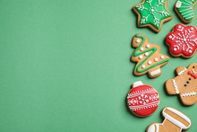 Flat Lay Composition With Tasty Homemade Christmas Cookies On Green Background, Space For Text