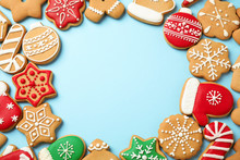 Flat Lay Composition With Tasty Homemade Christmas Cookies On Light Blue Background, Space For Text