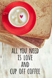 All you need is love and cup off coffee. coffee in red Cup and books. beautiful composition with Cup of cappuccino on rustic background. romantic concept. top view. 